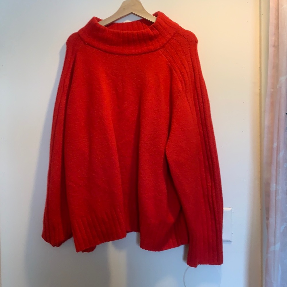 Red oversized turtleneck sweater